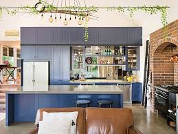 Under cabinet storage like hanging wine glass racks set stemware upside down to make use of vertical space and keep dust out. Best Kitchens In Classic Blue Try Out The Trendiest Color In Many Tones