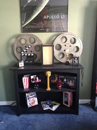 Most people forget about 'enjoying' life when they get carried away with work, but travel themed decor could become a constant reminder. Movie Themed Room Bachelor Pad Pinterest Movie Room Decor Movie Themed Rooms Movie Room