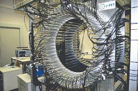 • newer scintillators (more efficient). J Pet S Plastic Revolution Cern Courier