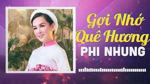 Cô cũng kể rằng chiếc áo dài đầu tiên mình. Goi Nho Que Huong Phi Nhung Shazam