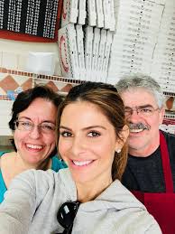 Chamber members, George and Helen Kapernekas, owners of Pizza Pizzazz  Danielson were visited by their niece, television journalist Maria Menounos  for a special steak bomb grinder! Great smiles all around!