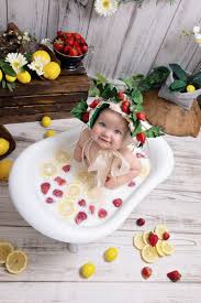 White can become boring after a while, so try to diversify the milk bath photography with colors. Baby Milk Bath Session Dallas Child Photographer
