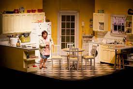 Set designers plan, design, and oversee the construction of sets for theatrical performances, visually conveying the mood, time, and place of the story. Shirley Valentine Western Canada Theatre