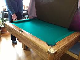 The dining table pool table combo from hathaway measures 74.75 l x 36.75 w with a table thickness of ¾ inches with red felt. Pool Dining Room Table Combo Brookline Ma Patch