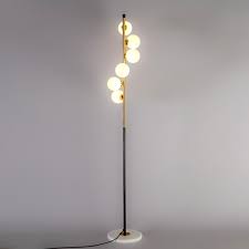 For the minimalist or the maximalist, and anybody in between, the frosted glass globe floor lamp is a classically beautiful design, with a touch of art deco styling. Frosted Glass Floor Lamp 6 Bulbs Uberlightingstore