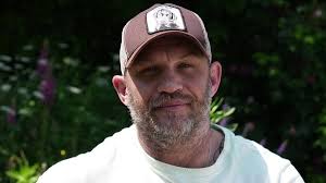 Mums swoon over Tom Hardy as he returns to CBeebies Bedtime Stories with  his beloved dog Blue