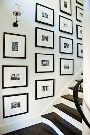 Black And White Gallery Wall Stairs Why Black And White Will Always Be The Perfect Color Pair In Any Home Gallery Wall Staircase Home Home Decor