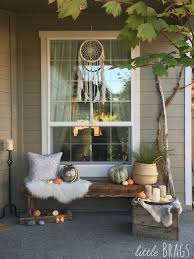 Complete your space and add warmth with outdoor string lights and lanterns. Little Brags A Natural Scandi Boho Style Fall Front Porch