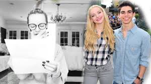 Dove cameron shows off her new tattoo to honor her late friend and fellow costar cameron boyce while filming a day in her life for vogue. Dove Cameron Cries During Emotional Tribute To The Late Cameron Boyce Youtube