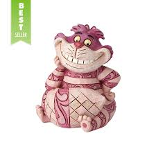 Mini Cheshire Cat Jim Shore Cheshire cat, fictional character, a cat notable for its broad grin and its ability to disappear and reappear at will, in alice's adventures in wonderland (1865) by lewis carroll. disney