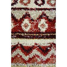 Pile height, this rug can handle the busiest rooms of your home while remaining cozy underfoot. Multicoloured Aztec Rug Home George