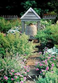 A Lovely Garden With A Bee Skep Bee Garden Design Bee Skep Bee Skep House