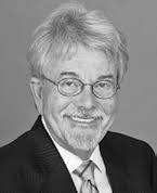 COMMISSIONER DEREK D. MALAN