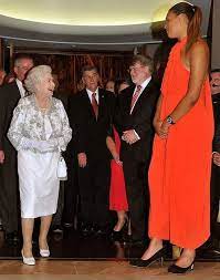 Curt miller coaches his connecticut sun from the sideline. Not Photoshopped 6 8 Australian Basketball Player Liz Cambage Meets Queen Elizabeth Tall Women Fashion Tall Women Tall Girl