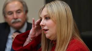 The teacher spent nearly two weeks in the hospital, required six surgeries  and does not have the full use of her left hand. The bullet narrowly missed  her heart and remains in