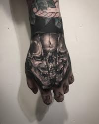 Black And Grey Foo Dog Hand Tattoo Blackwork By Gara Hand Tattoos Hand Tattoos For Guys Japanese Hand Tattoos