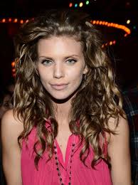This 'do is a departure from her usual styles which tend to make the most of her thick, naturally because annalynne has a lot of angles in her face, layered styles work best for her as they soften up the jaw line and give her 'do a soft finish. Hollywood S Prettiest Head Of Curls Made An Appearance Over The Weekend Glamour