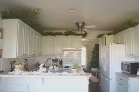 How to decorate your home for the holiday season using a mix of family heirlooms and new pieces. Lovely Greenery Above Kitchen Cabinets The Most Incredible And Lovely Greenery Above Kitchen Cabinets With Regard To Really Encourage The House Present House