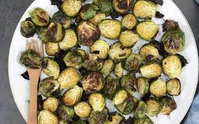 How to make perfectly roasted brussels sprouts with garlic and ham. Oven Roasted Brussels Sprouts Heather Mangieri Nutrition