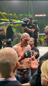 Kamaru Usman MMA telah menambah foto...