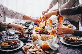 Appetizers are the most exciting part of every party. Friends Having A Dinner Party With Different Kinds Of Appetizers Stock Photo Picture And Royalty Free Image Image 124107359
