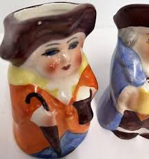 Vintage mini Toby style creamers