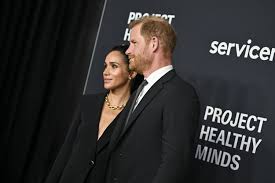 Prince Harry Holds Back Tears at Emotional Appearance With Meghan Markle