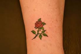 Your tattoo can be a goal, s symbolic journey you have or a memory of who you were. 24 Small Rose Tattoos Ideas Rose Tattoos Tattoos Small Rose Tattoo