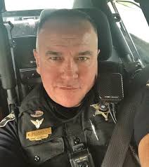 Hey, man, that car just flashed his lights...must be a cop up ahead. Slow  down." ----------------------------------------------------------------  Deputy Keith Plunkett is a motorcycle patrol deputy serving with the  Bossier Parish Sheriff's Office. He