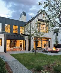 Don't forget to install a wooden fence. Modern Farmhouse Exterior Design Ideas Trendecors