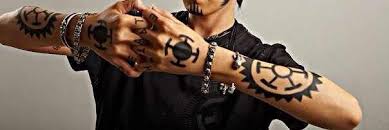 Maybe you would like to learn more about one of these? Trafalgar One Piece Tattoos Law Tattoo One Piece Cosplay