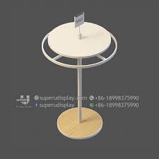 Features an upright made of 2 round tubing, with an adjustable height from 48 to 63 and an interior upright that measures 1 15/16. Custom Rotating Round Hanging Garment Rack For Retail Shop Store Display Design Manufacturer Supplier Store Display Design Clothing Display Rack Garment Racks