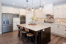 Kitchen island ideas design yours to fit your needs this old house. Antique Ivory Kitchen With A Contrasting Island Crystal Cabinets