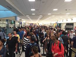 Bathrooms include shower/tub combinations with rainfall showerheads, complimentary toiletries, and hair dryers. San Juan Airport Restroom San Juan Puerto Rico Luis Munoz Marin Airport Sju Blind The San Juan Airport Officially Known As The San Juan Luis Munoz Marin International Airport