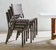 Made for use in a sun room or indoor area only. Torrey Indoor Outdoor All Weather Wicker Stackable Dining Chair Charcoal Gray Pottery Barn