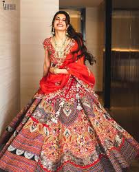 Jacqueline Fernandez In A Red Anamika Khanna Bridal Lehenga Bollywood Fashion Lehenga Designs Jacqueline Fernandez So go for shades that are next to each other in the color wheel for a unique designer wedding lehenga. jacqueline fernandez in a red anamika