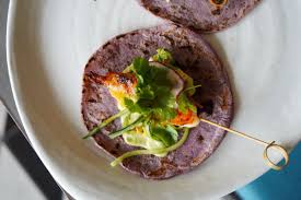 Make a spicy slaw with shredded green cabbage, mayo, cayenne pepper, and lime juice, and serve it on top of the fish tacos. Behold The Menu At Bobby Flay S New Seafood Restaurant Eater Vegas