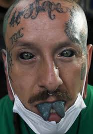 The bottom of the tongue can be tattooed with a tattoo machine and will hold because it lacks the thick layer of taste buds that the top does. Ap Photos In Mexico Prejudice Fades Around Tattoos Taiwan News 2019 05 24 01 47 30