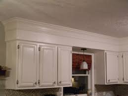 For kitchens with ceilings from 11 to 13 feet, one of the most an alternative solution in kitchens with taller ceilings is to simply stop the cabinets short of the ceiling and top them with a thick crown molding. Pin By Lane Crabtree On Home Decor Kitchen Soffit Kitchen Cabinet Crown Molding Above Kitchen Cabinets