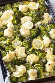 Lemon Garlic Roasted Broccoli And Cauliflower Is A Simple Side Dish Made With Only A Few Ingredi Side Dishes Easy Roast Broccoli And Cauliflower Fried Broccoli