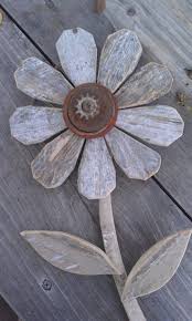 Stratton home decor floral metal & wood wall decor sale $105.99. Reclaimed Wood Flower Rustic Wall Decor Rusty Metal Folk Art Garden Art Industrial Wood Flowers Wooden Flowers Wood Crafts