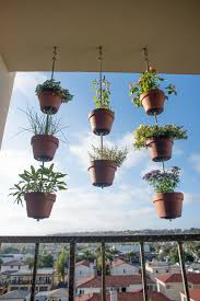 See more ideas about diy hanging planter, diy hanging, hanging planters. Vertical Garden Ideas Hanging Clay Pots For Your Plants The Horticult