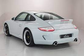 Basalt black metallic with full black leather interior. An 80 Mile 2010 Porsche 911 Sport Classic Is Up For Sale