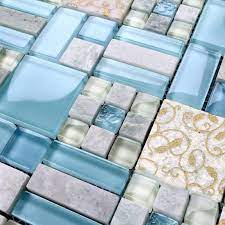 Description this mosaic linear wall tile is interlocking design with blue crystal glass and grey nature marble and stainless steel. Backsplash Tiles Kitchen Blue Glass Stone Blend Mosaic Natural Marble Bathroom Shower Wall Mosaic Tile Backsplash Blue Glass Tile Blue Glass Tile Backsplash