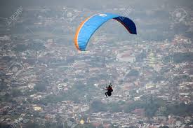 Badminton / bulu tangkis · 3. Paraglider Playing Paralayang Sport In Batu City East Java Indonesia Stock Photo Picture And Royalty Free Image Image 130416146