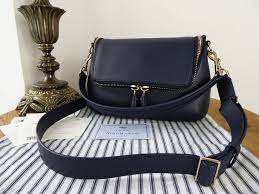 Maybe you would like to learn more about one of these? Anya Hindmarch Maxi Zip Crossbody Satchel In Indigo Satin Calf Sold