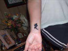 Tattoos are true works of art that can be used as incredibly great ways to represent something that you love, honor a lost loved one, or to simply get a design on your body that is just cool to look at. Chinese Symbol Tattoo On Wrist Express His Love For His Beloved Tattooimages Biz