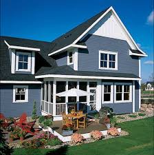 The first option that we want to talk about here is the light grey deck color. Beautiful Coastal Blue Exteriors The Happy Housie