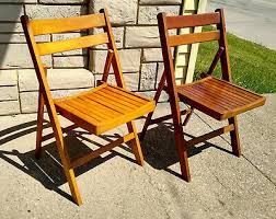 Made from mahogany wood with a vertically slatted back, this chair is simple and classic. Post 1950 Wood Slat Vatican