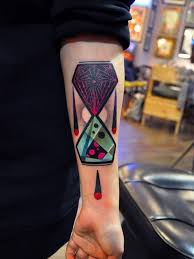 The skull is generally a sign of death or the end of life. Geometric Hourglass Tattoo On Arm